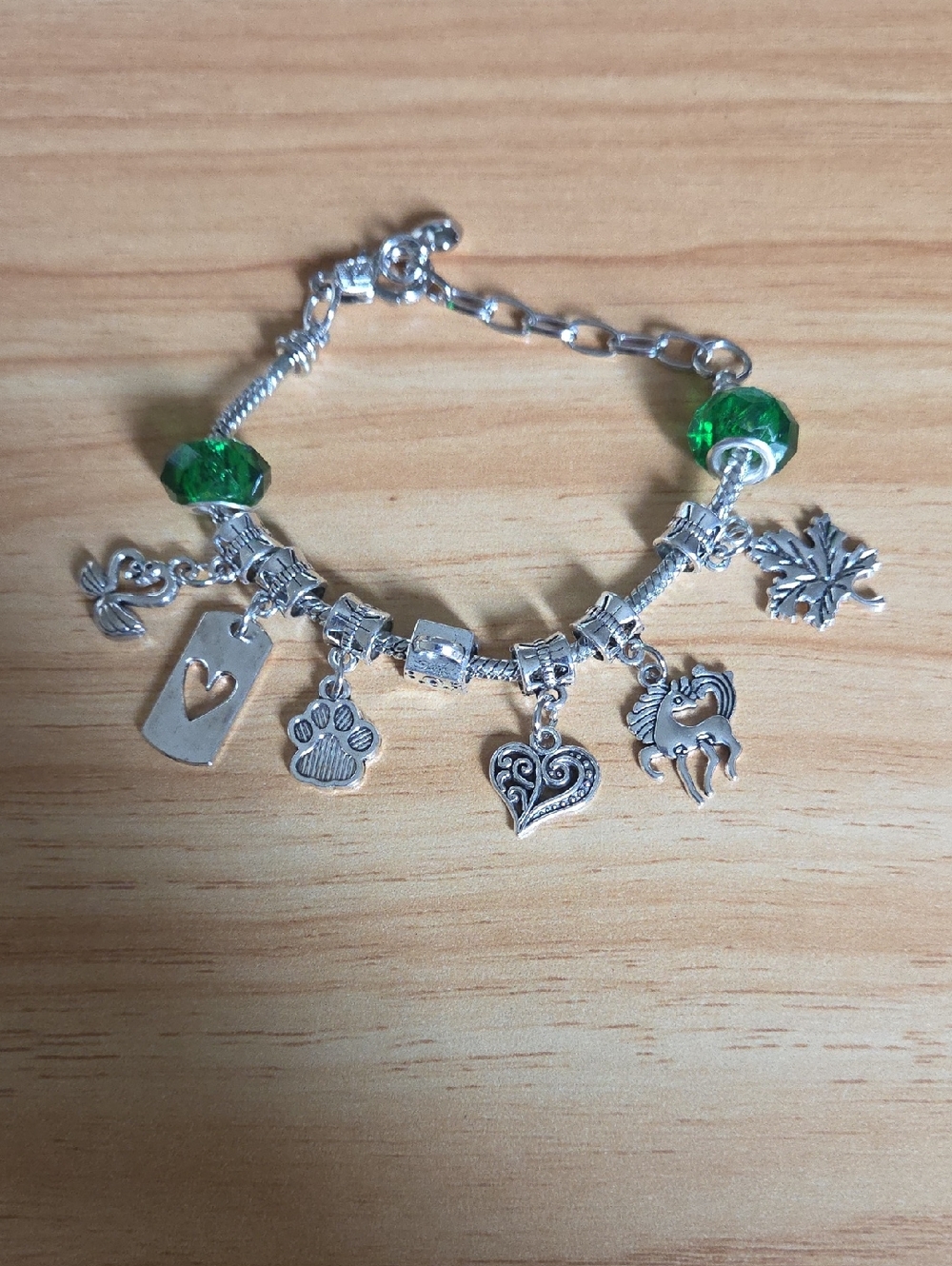 Silver Charm Bracelet with Green Beads and Heart & Paw Accents